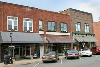 Small town businesses in a downtown setting.